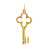 Gold key-shaped charm on a white background