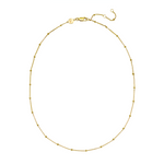 Gold necklace on a white background