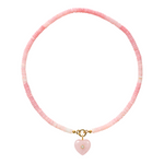 pink beaded necklace with a pink heart charm