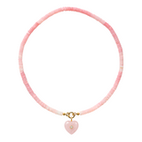 pink beaded necklace with a pink heart charm