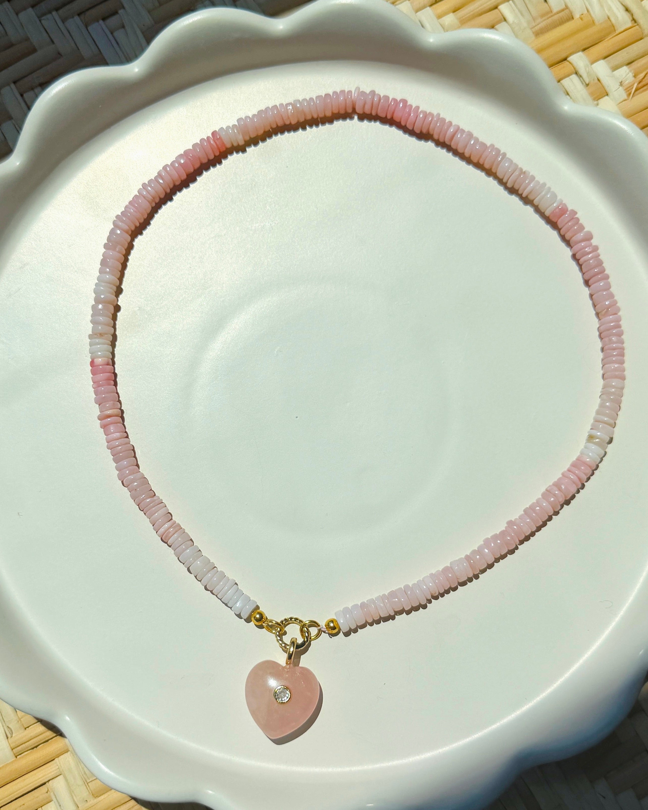 pink stone heart on rose beaded strand