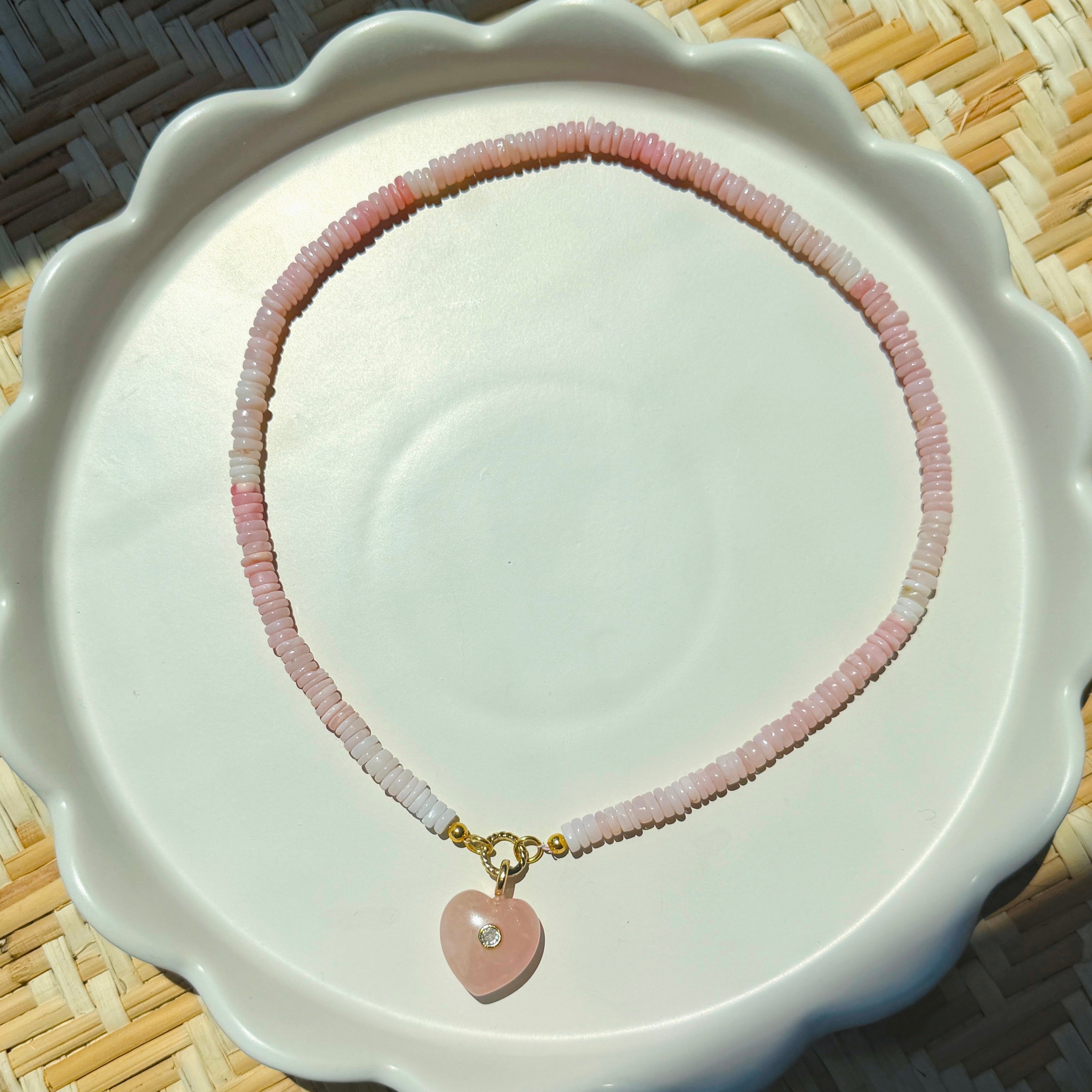pink stone heart on rose beaded strand