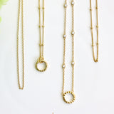 assortment of gold chains