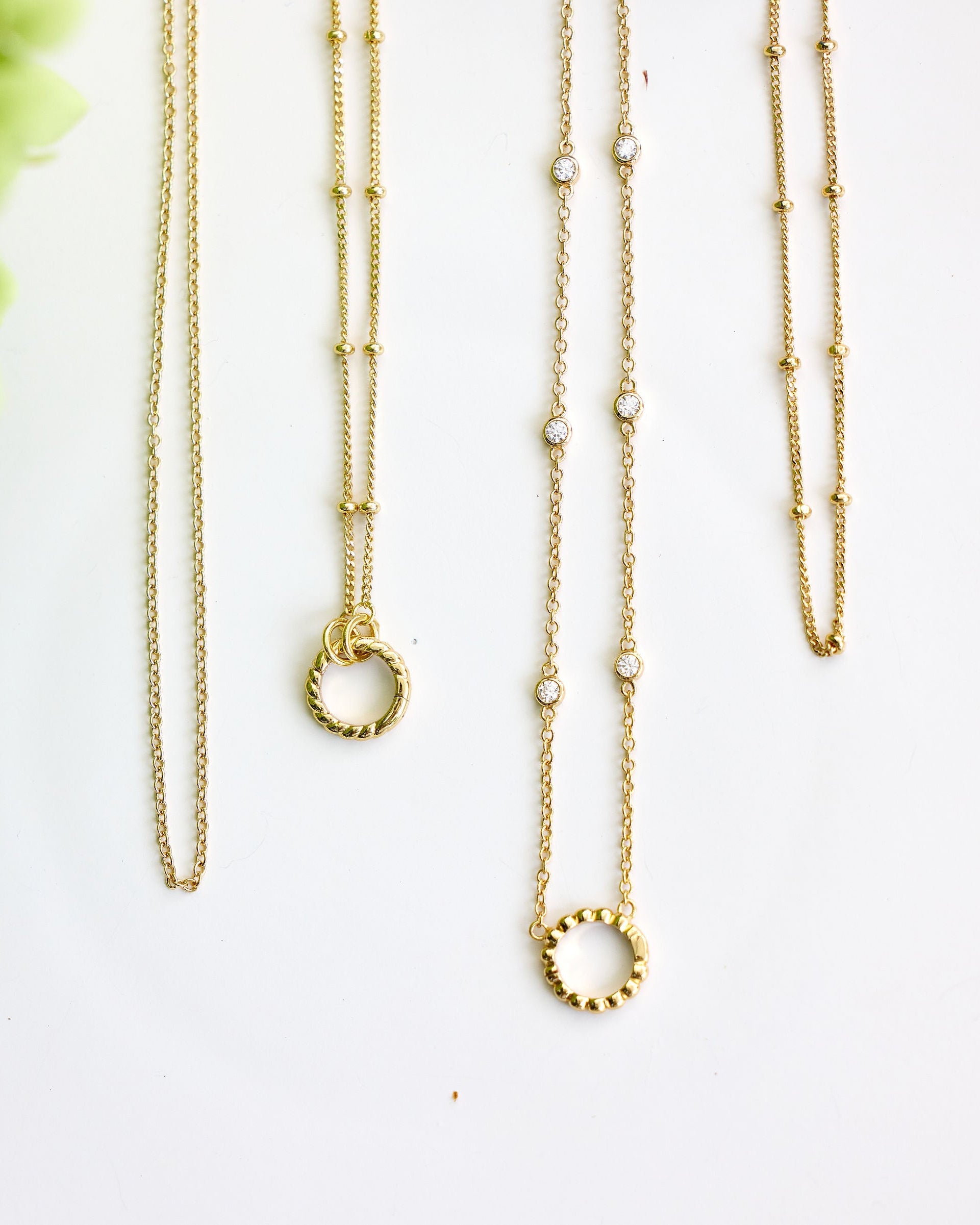 assortment of gold chains
