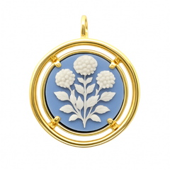 Golden cameo pendant with blue and white floral design 