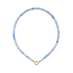 blue beaded necklace with gold charm keeper