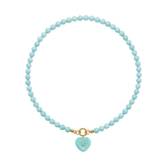 Turquoise beaded necklace with a heart-shaped pendant on a white background