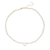 Pearl necklace with gold clasp on a white background