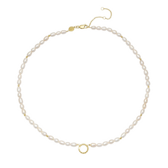 Pearl necklace with gold clasp on a white background
