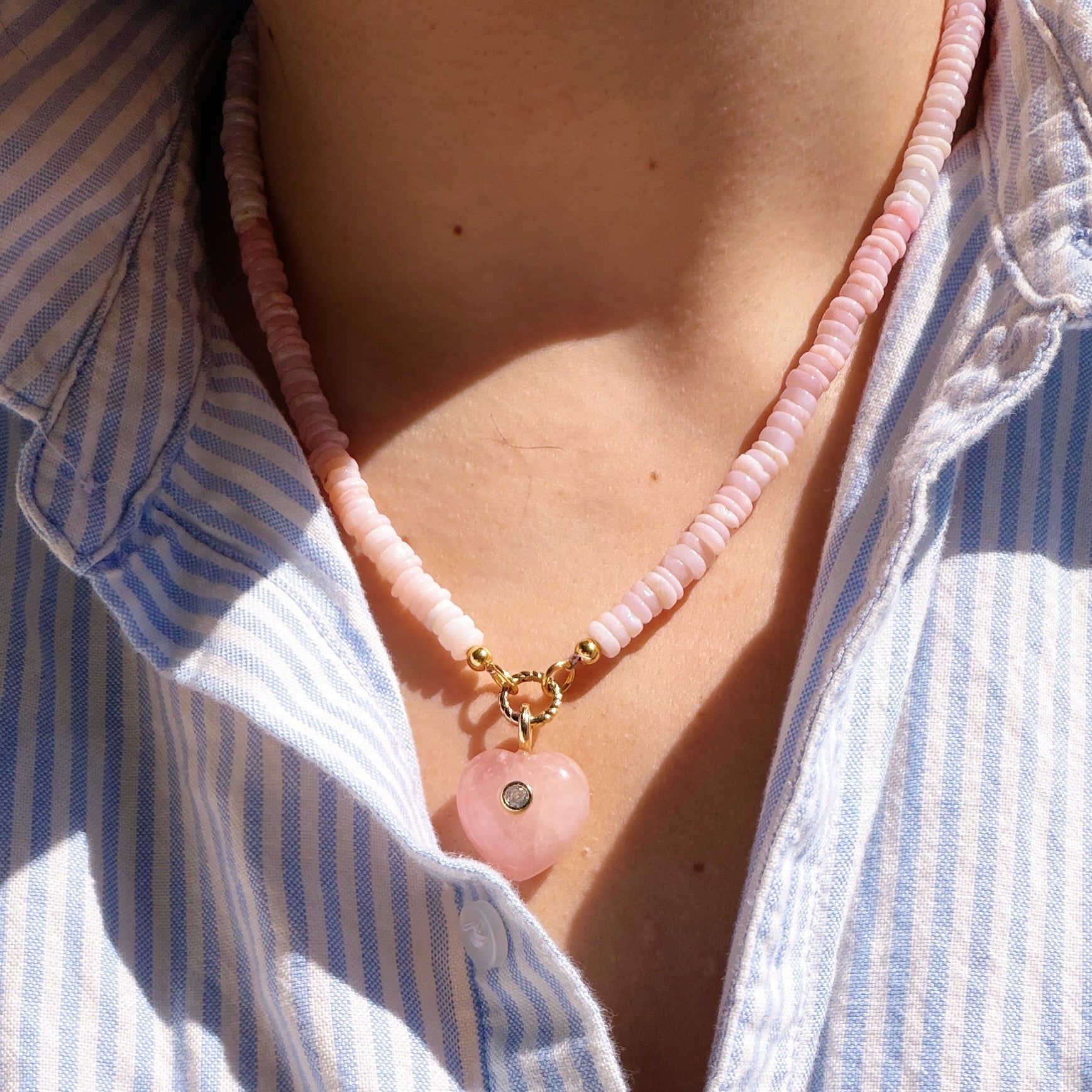 Pink stone heart charm on pink beaded chain