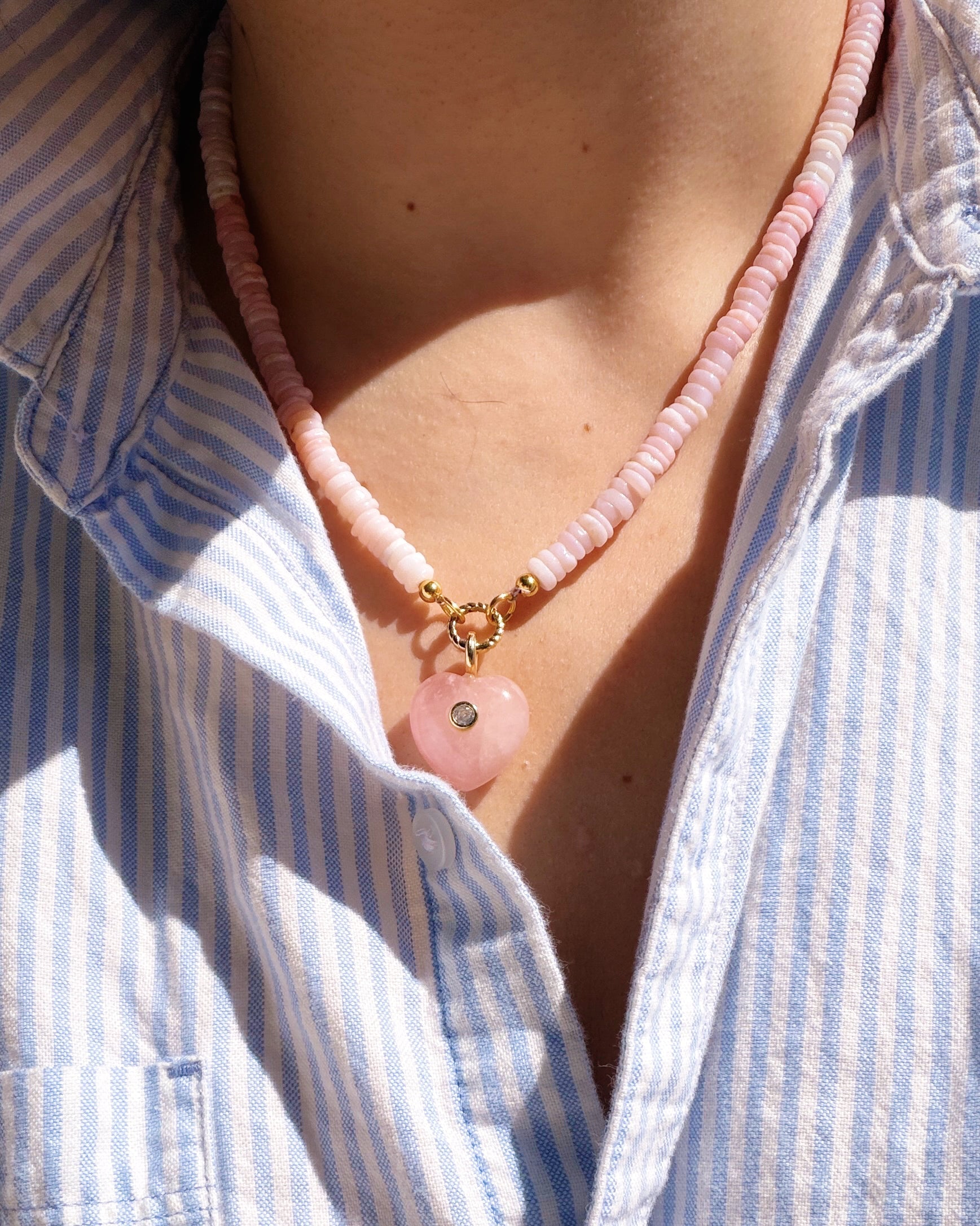 Pink stone heart charm on pink beaded chain