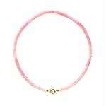 Pink beaded necklace with a gold clasp on a white background