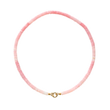 Pink beaded necklace with a gold clasp on a white background