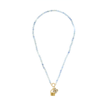 blue beaded necklace with charms