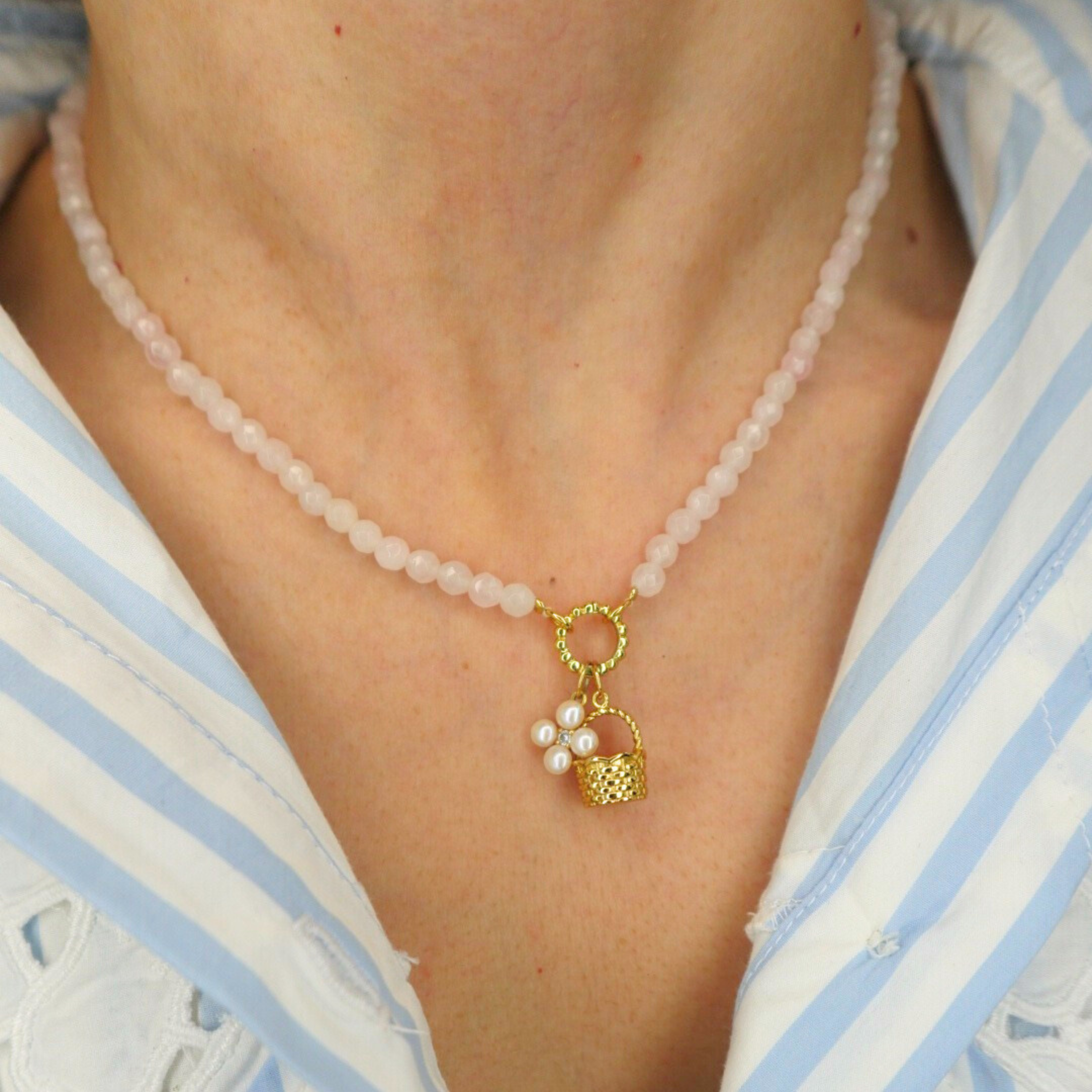 rose quartz necklace with a basket charm and pearl flower charm